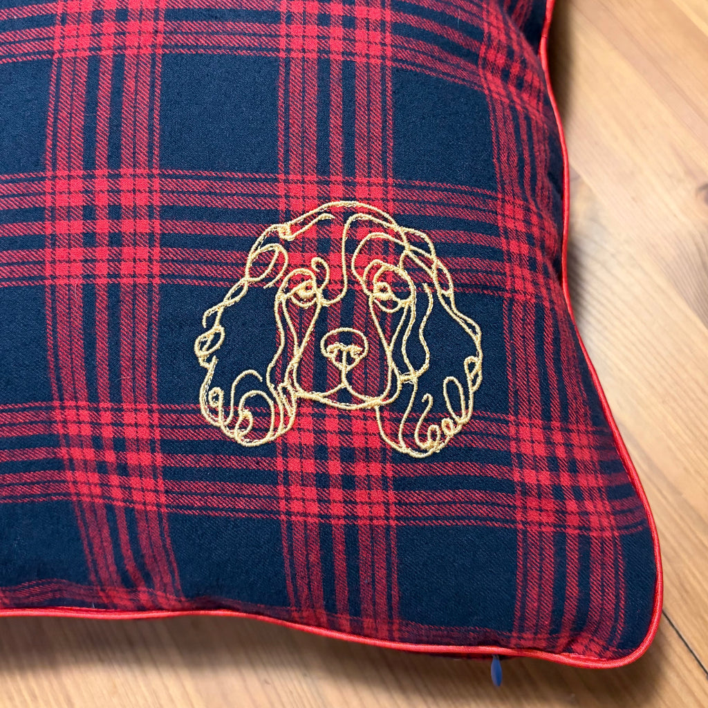 spaniel face on a cushion